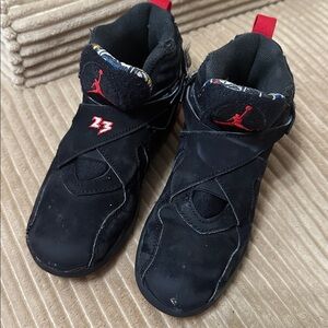 Free with $20 purchase! Black and Red Air Jordan high top